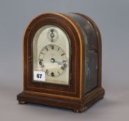 A German chiming mantel clock, with arched glass case height 22.5cm