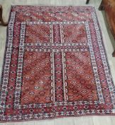 A Tekke style red ground rug 164 x 130cm