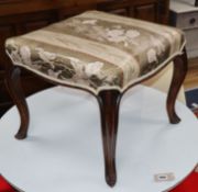 A Victorian mahogany upholstered stool