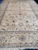 A large Ziegler style ivory ground carpet 560 x 380cm