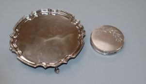 A 1950's silver waiter and a silver compact.