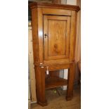 An elm corner cupboard H.188cm