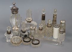 Seventeen assorted late Victorian and later, silver or white metal mounted mainly glass scent