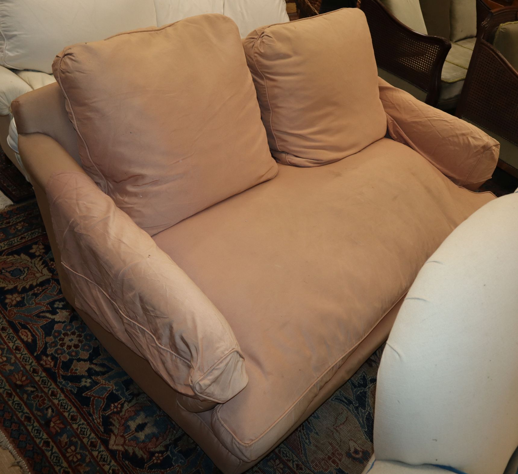 An early 20th century Howard style upholstered two seater settee W.163cm