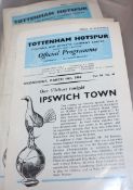 A large collection of Tottenham Hotspur memorabilia including programmes, official season handbooks,