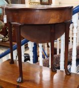 An 18th century demi-lune drop flap table W.74cm