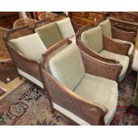 A 1920's carved beech four piece bergere suite