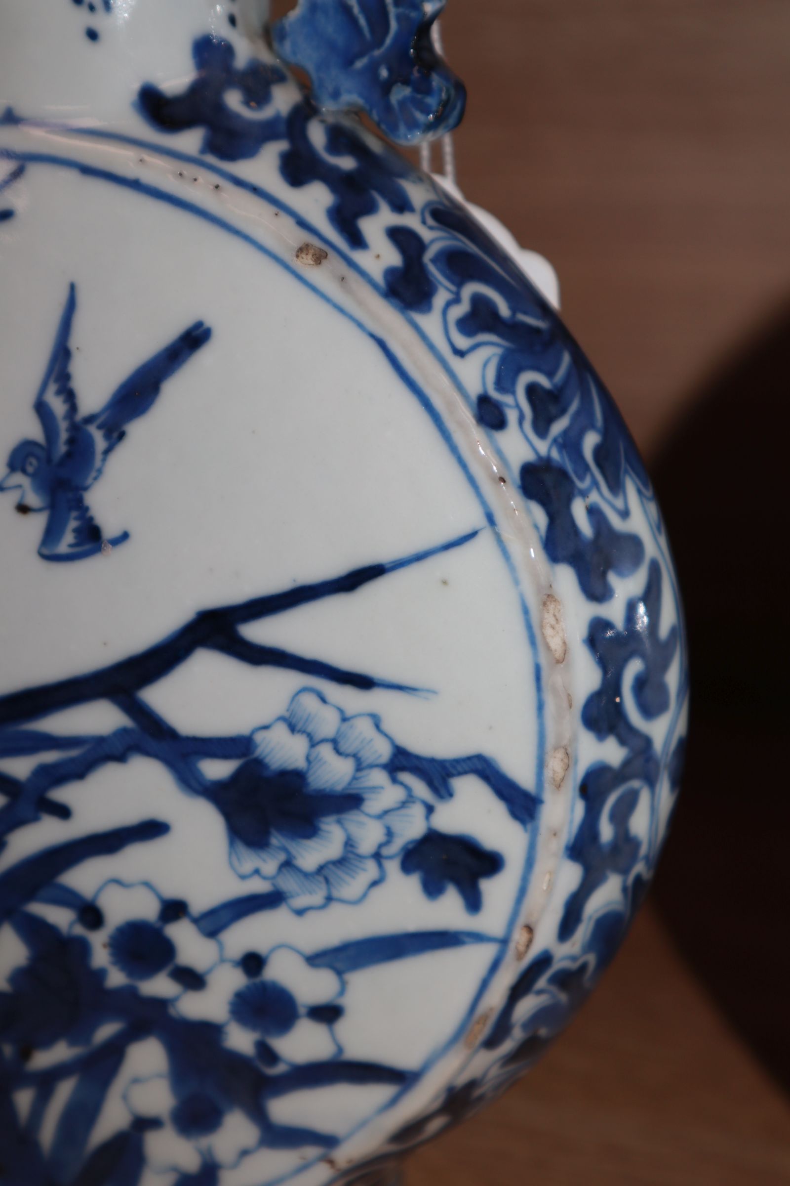 A pair of 19th century Chinese blue and white moon flasks, Kangxi marks, decorated birds and - Image 7 of 11