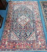 A Caucasian blue ground rug 200 x 138cm