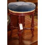 A Victorian style mahogany adjustable piano stool