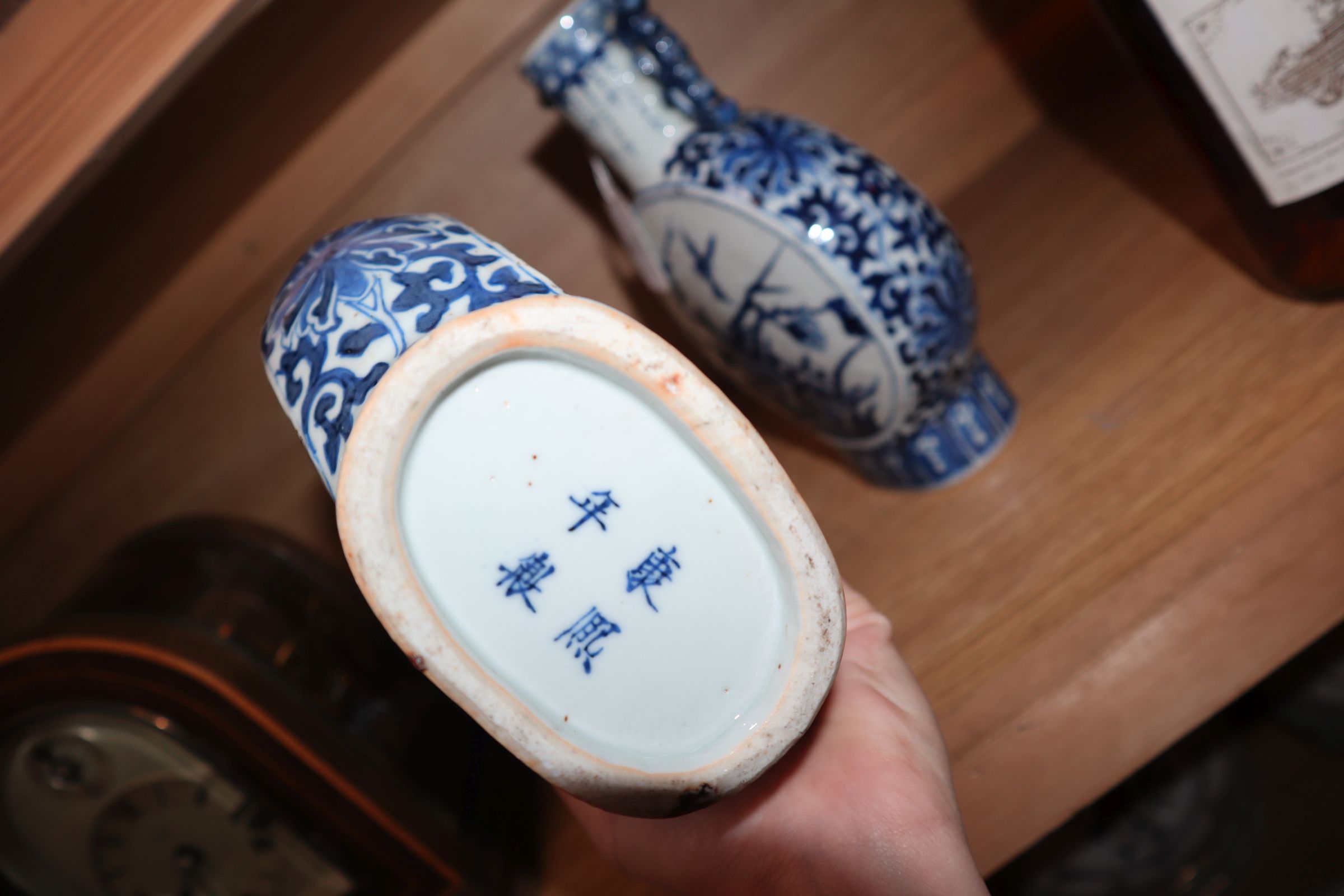 A pair of 19th century Chinese blue and white moon flasks, Kangxi marks, decorated birds and - Image 11 of 11