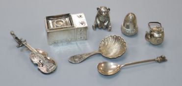 Small silver and white metal items including tea kettle on cooker, caddy spoon, miniature fiddle,