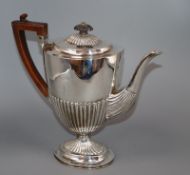 A late Victorian demi-fluted silver oval coffee pot, Charles Stuart Harris, London, 1896, gross 28