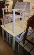 A painted garden table and six chairs Table L.151cm