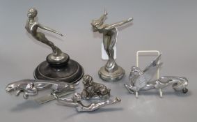 A collection of three chrome car mascots including a Jaguar, Spirit of Ecstasy, Pegasus, etc.