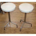 A pair of mid century chrome stools H.58cm