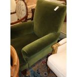 An Edwardian upholstered armchair