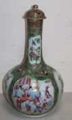 A large Chinese famille rose bottled vase and cover, mid 19th century (restored) height 46cm