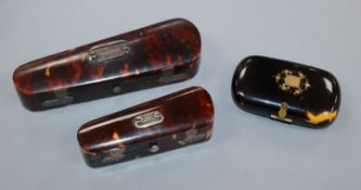 Two silver mounted tortoiseshell 'violin' shaped small cases and a tortoiseshell purse