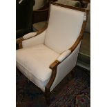 A French oak upholstered fauteuil