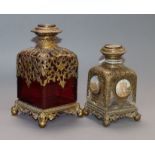 Two 19th century French gilt metal mounted glass scent bottles tallest 13cm