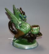 A Brannam pottery 'griffin' chamberstick, c.1902 height 15cm