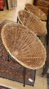 After Terence Conran, three wicker and iron tub chairs