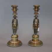 A pair of 19th century bronze 'caryatid' candlesticks