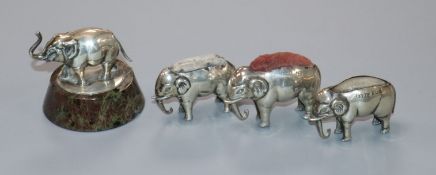 Three Edwardian novelty silver elephant pin cushions, Birmingham, 1905/6 and a miniature silver