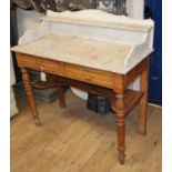 A Victorian marble-topped washstand