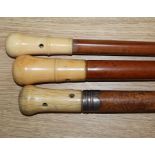 Three ivory handled walking canes longest 90cm