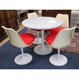 A 1960's pedestal table and four chairs Table Diameter 90cm