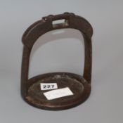 A Chinese bronze stirrup H.17cm