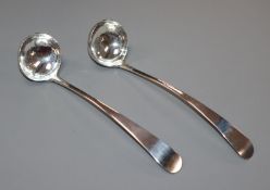 A pair of George III Scottish silver Old English pattern cream ladles, by John Zeigler, Edinburgh,