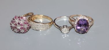 Four assorted 9ct and gem set dress ring including white gold and diamond cluster, gross 12 grams.