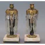 A pair of early Victorian ormolu and onyx lustre candlesticks height 24cm