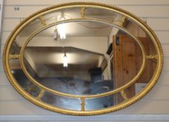 A gilt frame marginal plate wall mirror, W.112cm