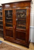 A 19th century French walnut armoire W.146cm