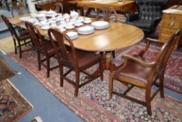 A set of eight Hepplewhite style mahogany dining chairs (2 arm, 5 single), and a Regency style