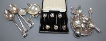 A set of four modern silver dishes, a small group of assorted silver flatware including a caddy