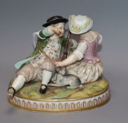 A Meissen group of a boy and a girl height 10cm