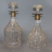 Two silver collared cut glass decanters and stoppers