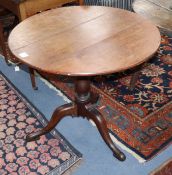 A George III oak tilt top tea table Diameter 76cm