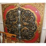 A carved Chinese style painted wood and composition two section panel decorated with mythical