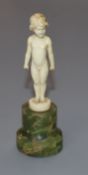 Ferdinand Preiss. A carved ivory figure of a standing girl on onyx plinth height 9.5cm