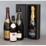 A bottle of Champagne, Moet and Chandon grand vintage 2004, a bottle of Bollinger 1996, a bottle