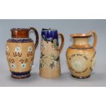 Three Doulton stoneware jugs tallest 21cm