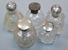 Five assorted early 20th century silver mounted glass scent bottles including Walker & Hall,