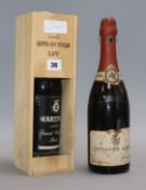 A bottle of Martinez vintage port, 1963 and a bottle of Edouade Aube 1911 champagne