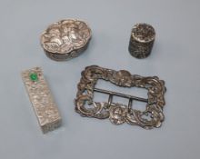 A late Victorian silver buckle, a William Comyns silver pill box, an 800 lipstick holder and a